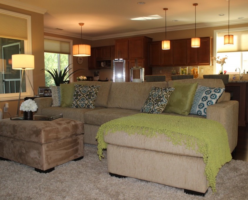 Modern living room featuring custom sectional and ottoman in Menifee, CA